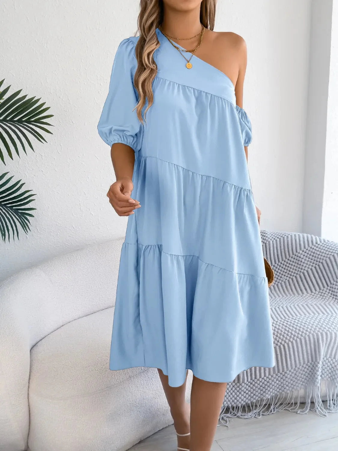 One-shoulder dress with layered ruffles