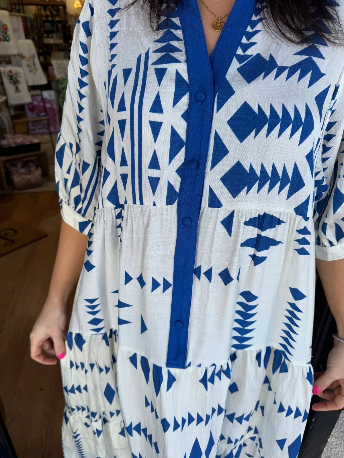 Women's V-neck button-down dress with geometric print