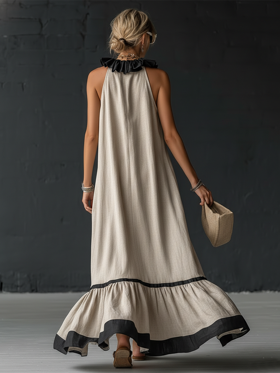 Élégante robe longue en coton et lin, sans manches, avec encolure en V, volants et blocs de couleurs.