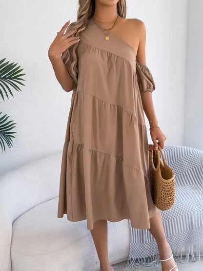 One-shoulder dress with layered ruffles