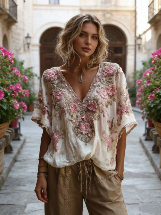 Short-sleeved V-neck bohemian blouse with pink floral embroidery and sequins