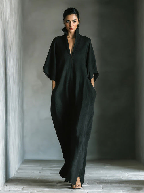 Robe longue élégante à col montant et manches chauve-souris
