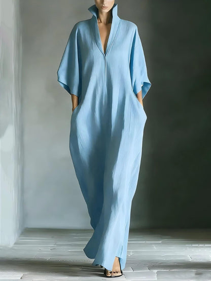 Robe longue élégante à col montant et manches chauve-souris