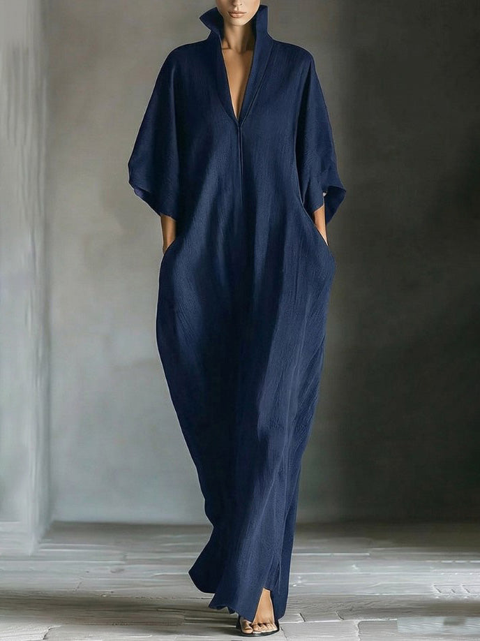 Robe longue élégante à col montant et manches chauve-souris