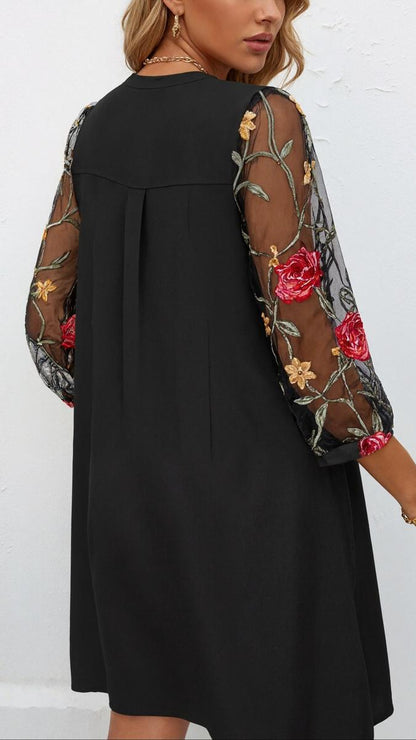Elegant V-neck mini dress with sheer sleeves