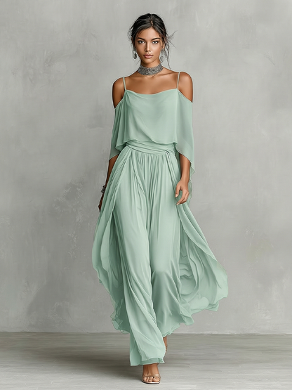 Robe longue femme grise en mousseline respirante avec détail épaules dénudées et silhouette évasée