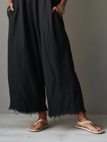Combinaison ample minimaliste pour femme en lin mélangé avec décolleté en dentelle, bretelles spaghetti et ourlets effilochés