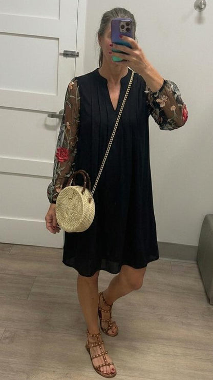 Elegant V-neck mini dress with sheer sleeves