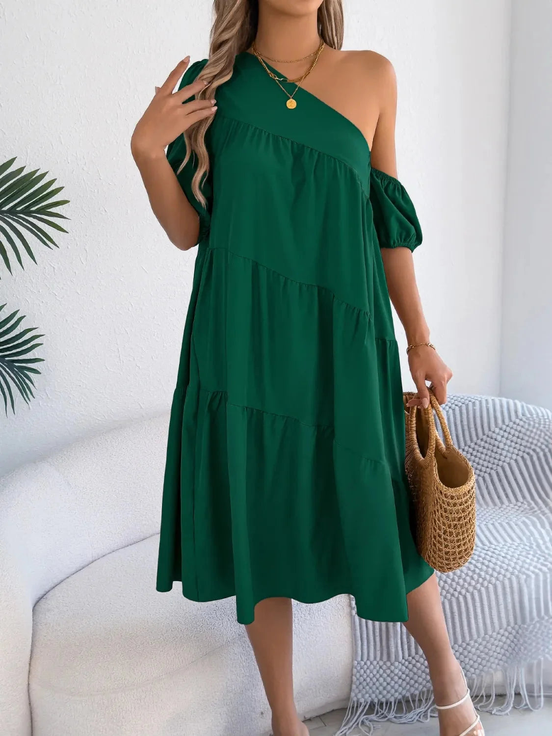One-shoulder dress with layered ruffles