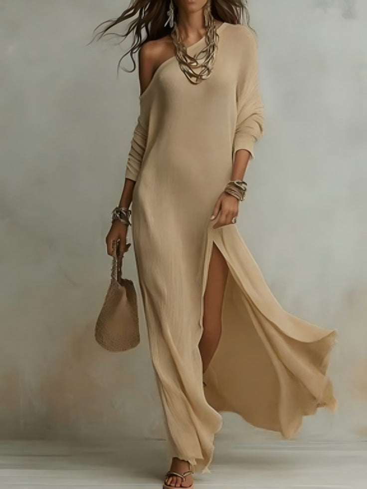 Elegant women's long-sleeved knitted dress, pleated with a slit