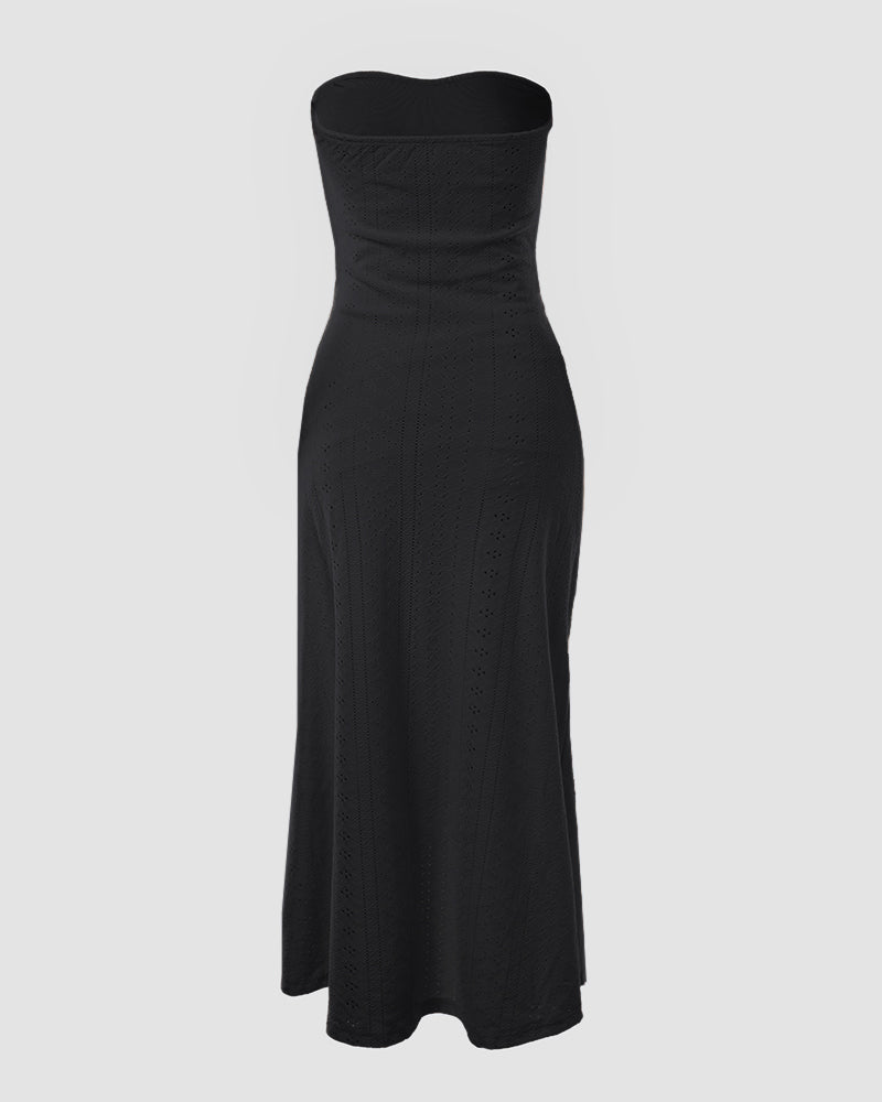 Sleeveless ruched vacation dress with a cinched waist, a draped bandeau-style bodice, eyelet embroidery, a slit, and an asymmetrical hem