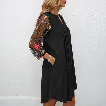 Elegant V-neck mini dress with sheer sleeves