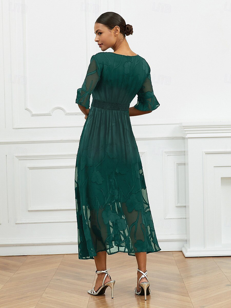 Robe florale col V à manches transparentes