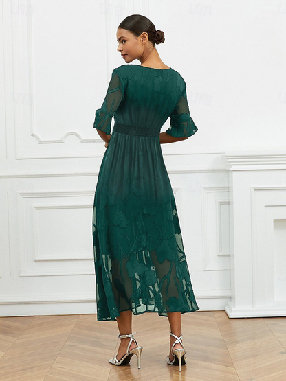 Robe florale col V à manches transparentes