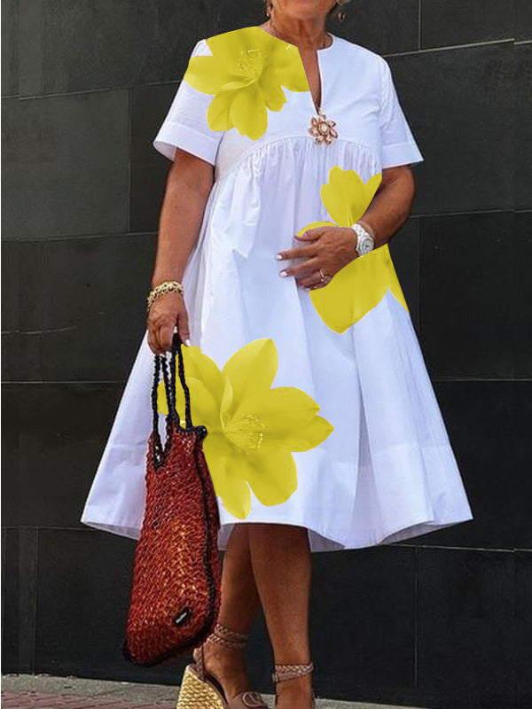 Robe midi plissée à imprimé et col en V