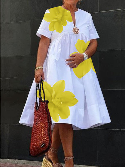 Robe midi plissée à imprimé et col en V