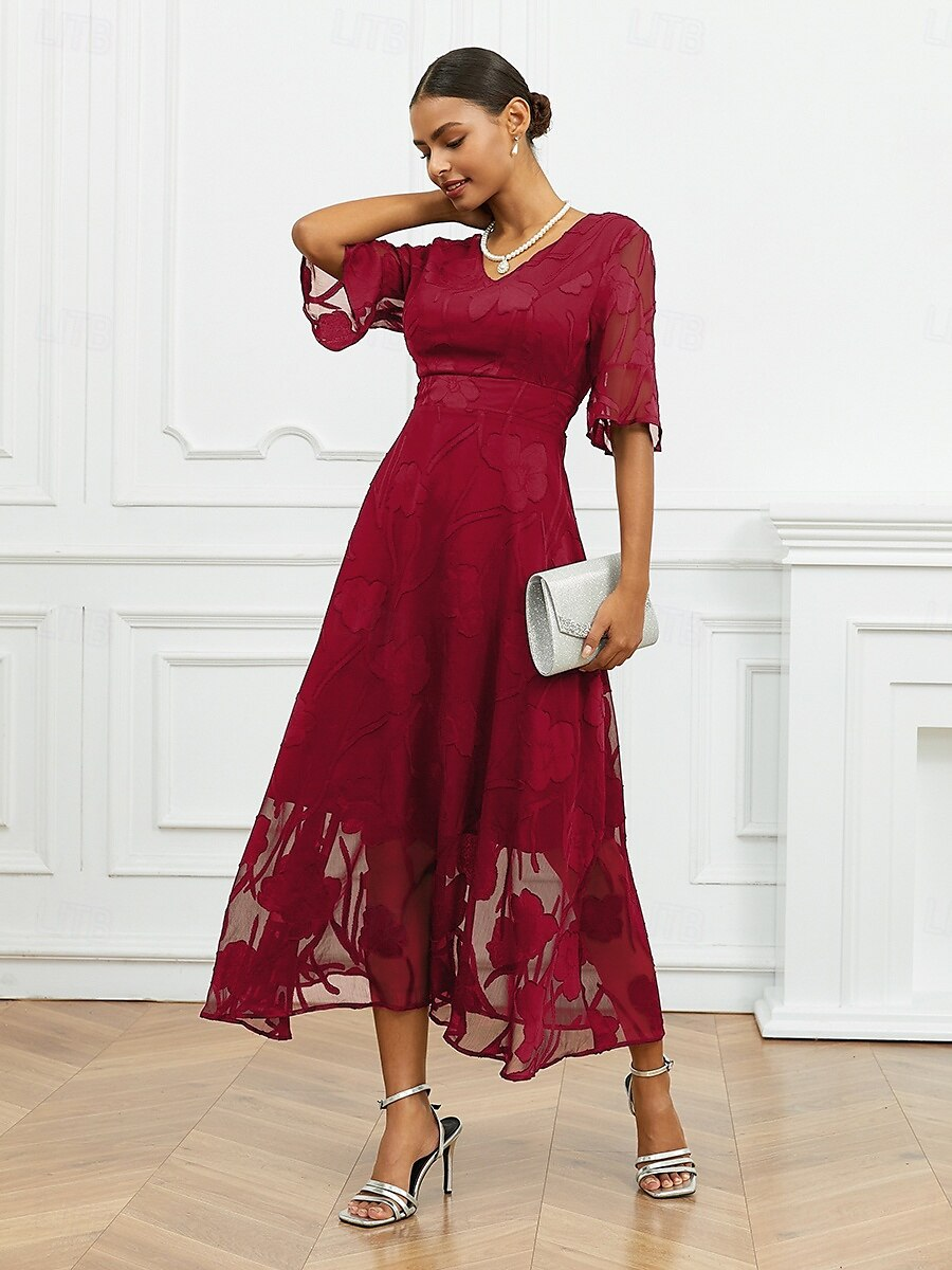 Robe florale col V à manches transparentes