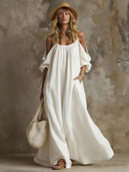 Robe longue caftan fluide blanche à manches bouffantes épaules dénudées avec poches