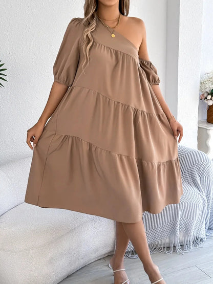 One-shoulder dress with layered ruffles