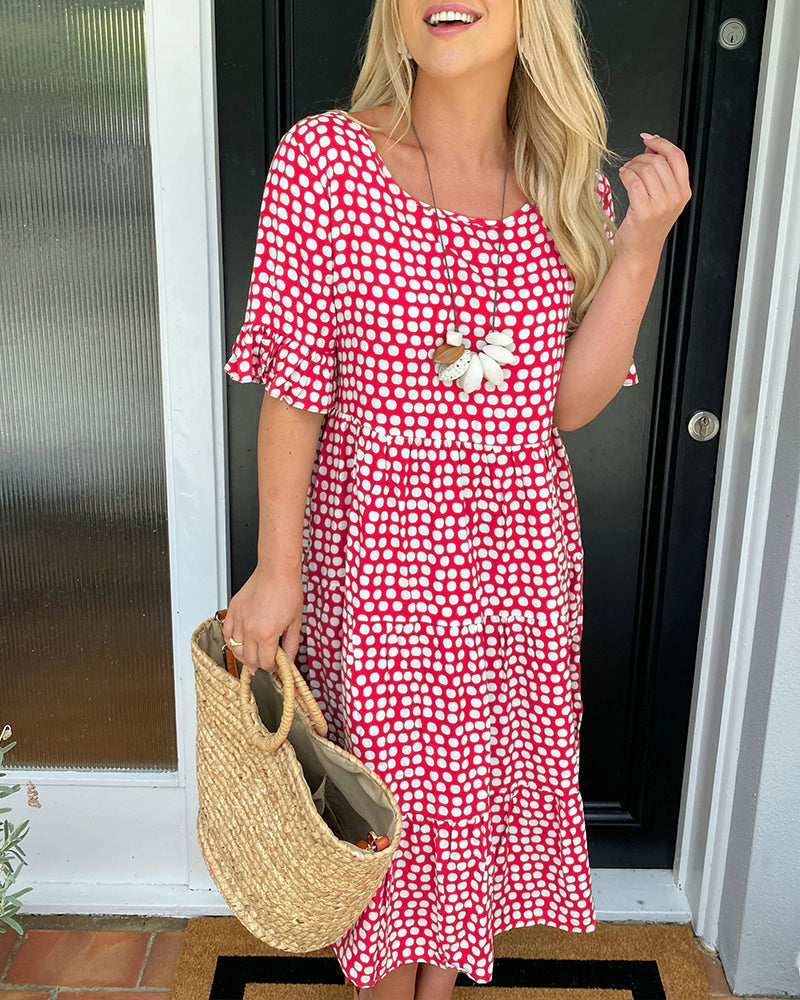Robe midi à col rond à imprimé à pois