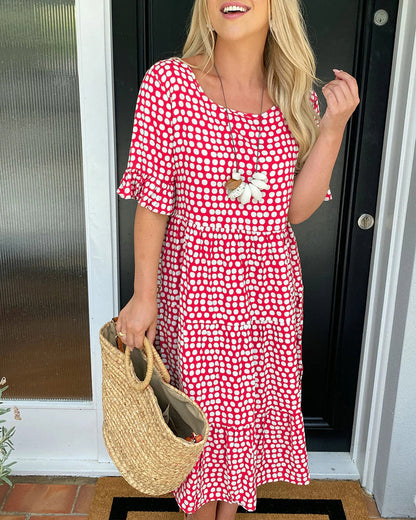 Robe midi à col rond à imprimé à pois