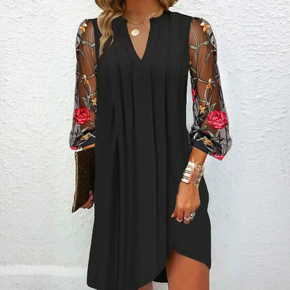 Elegant V-neck mini dress with sheer sleeves