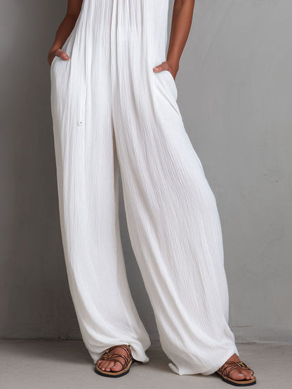 Combinaison plissée blanche dos nu et jambes larges Resort