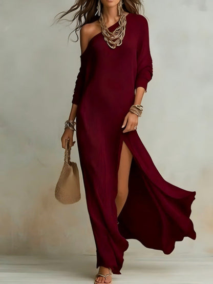 Elegant women's long-sleeved knitted dress, pleated with a slit