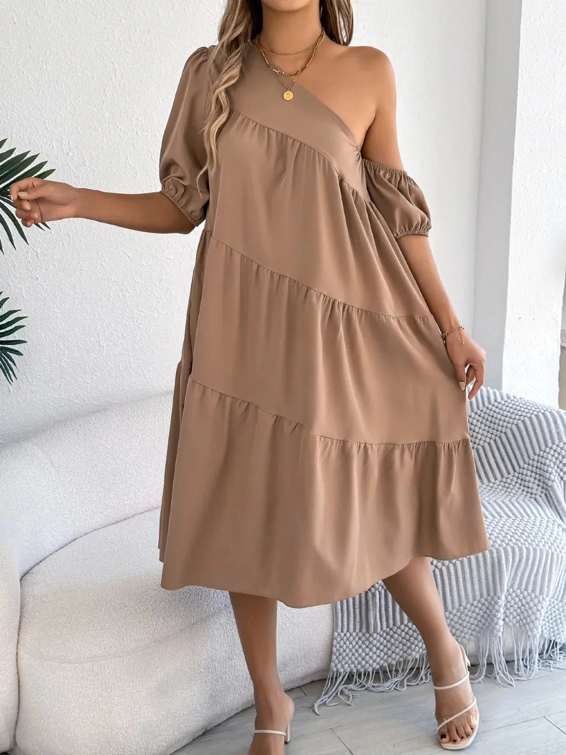 One-shoulder dress with layered ruffles