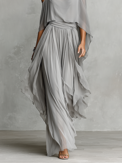 Robe longue femme grise en mousseline respirante avec détail épaules dénudées et silhouette évasée