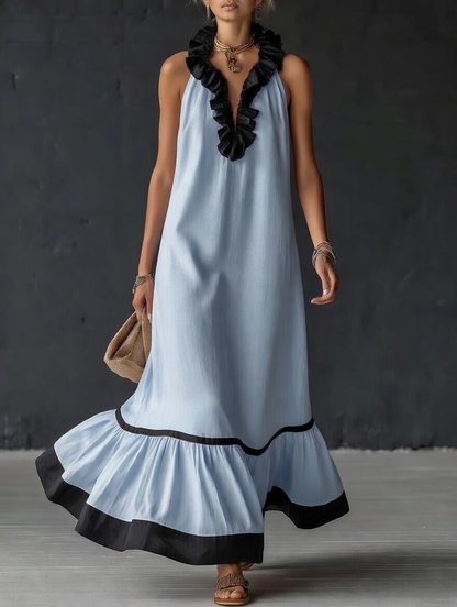 Élégante robe longue en coton et lin, sans manches, avec encolure en V, volants et blocs de couleurs.