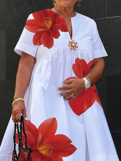 Robe midi plissée à imprimé et col en V
