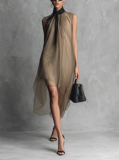 Robe midi asymétrique sans manches en maille transparente avec col à nouer