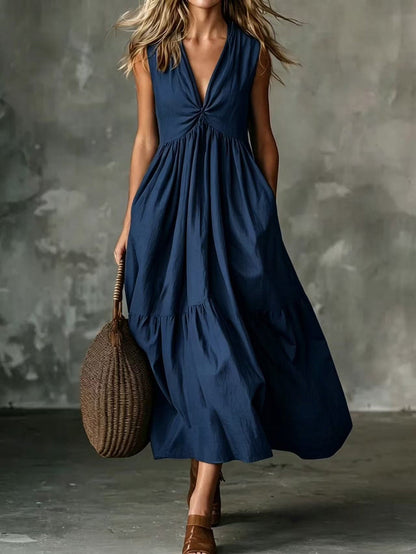 Robe longue texturée ample sans manches à col en V et devant torsadé avec poches