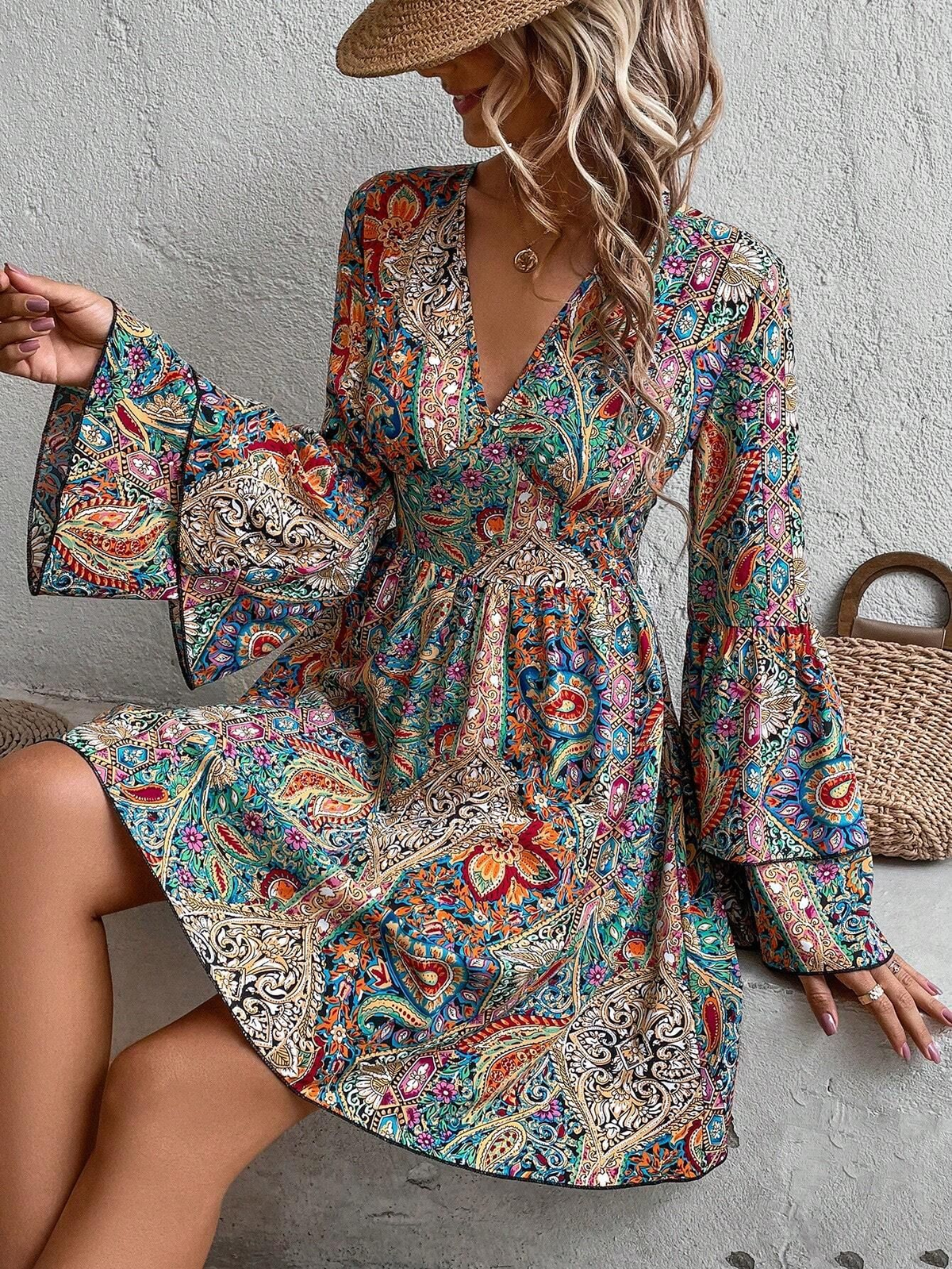 Bohemian dress with paisley and floral patterns, bell sleeves