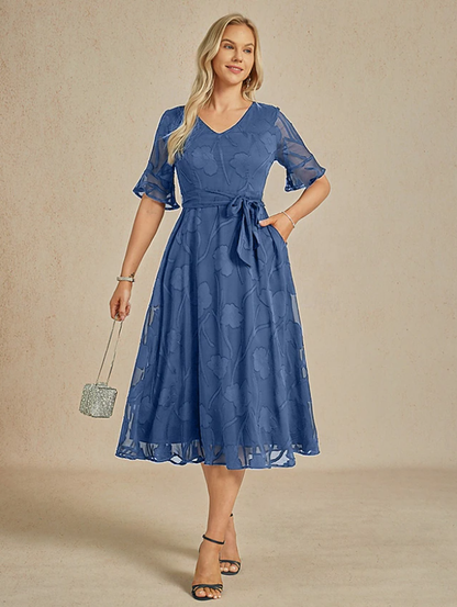 Robe florale col V à manches transparentes