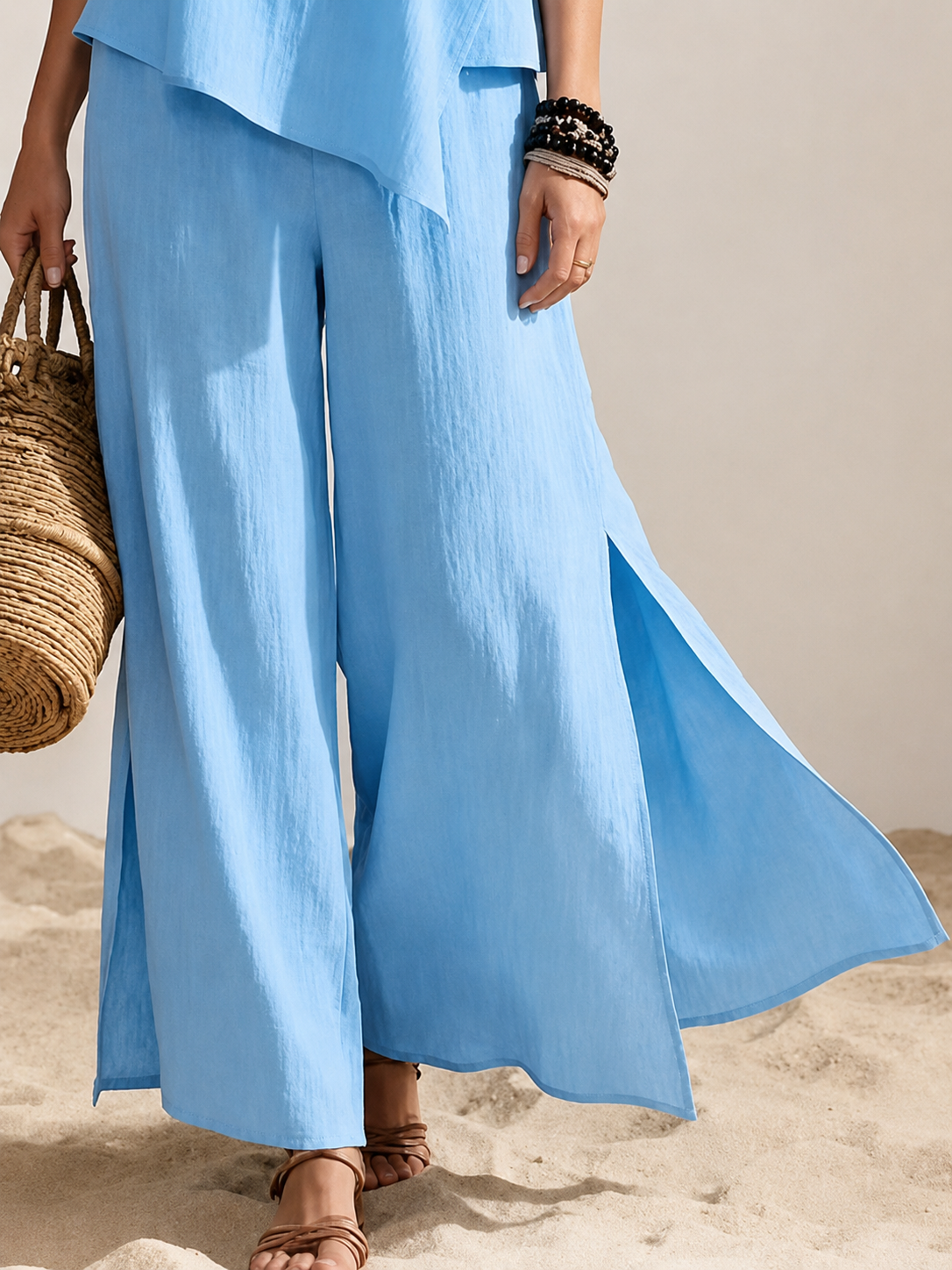 Ensemble deux pièces asymétrique en coton et lin à col rond + pantalon large à fentes latérales