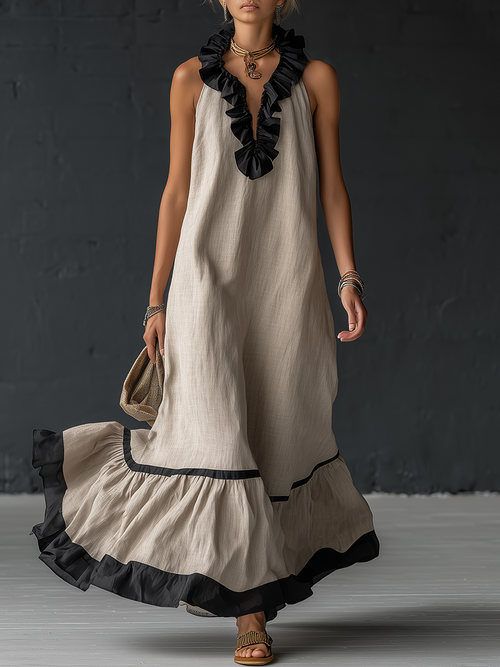 Élégante robe longue en coton et lin, sans manches, avec encolure en V, volants et blocs de couleurs.