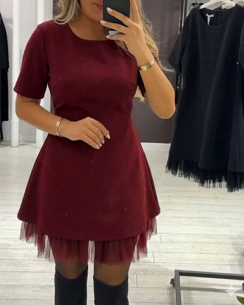 Elegant shimmering mesh patchwork dress