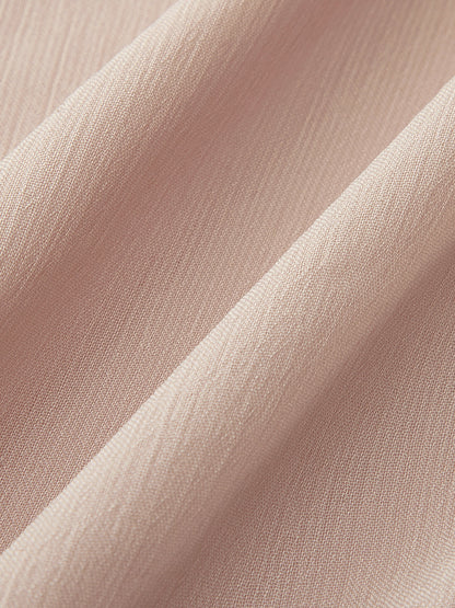 Robe à volants en mousseline semi-transparente avec cape extérieure