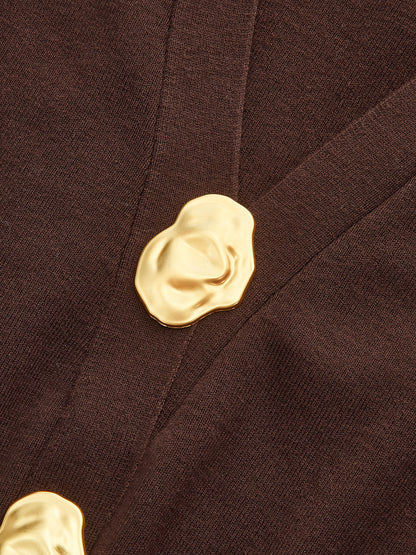 Pull en mélange de laine à col V avec détails métallisés
