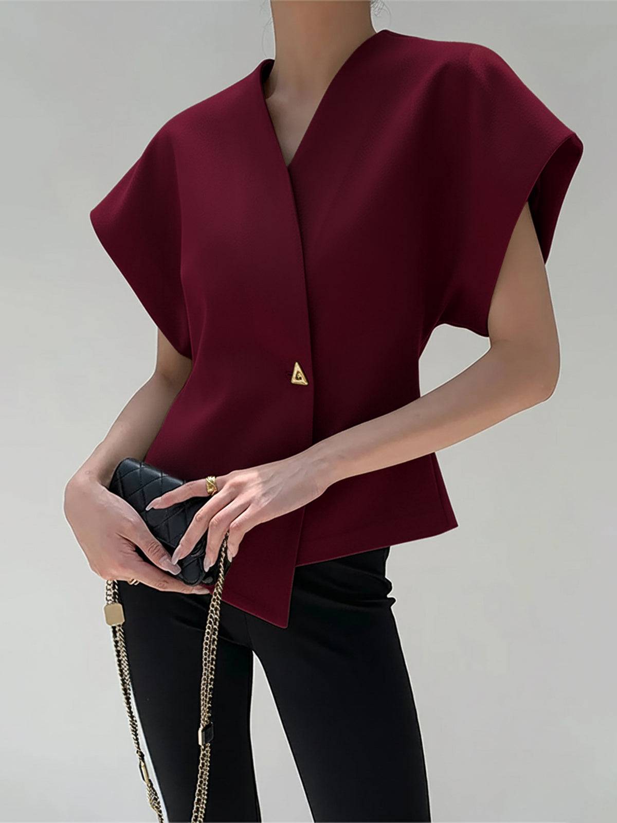 Trendy V-neck button-down blouse