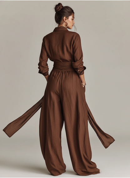 Elegant brown woven cotton-linen women's jumpsuit with long sleeves, shirt collar, and belt