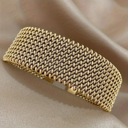 Golden cuff bracelet with mesh chain