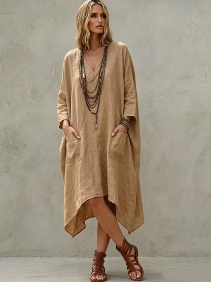 Robe midi en lin mélangé à col en V, manches 3/4, ourlet irrégulier et poches latérales