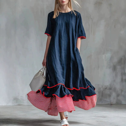 Robe longue ample en lin à rayures passepoilées et ourlet à volants