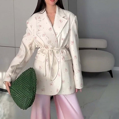 Blazer oversize ceinturé à manches bouffantes – Une élégance moderne et sophistiquée