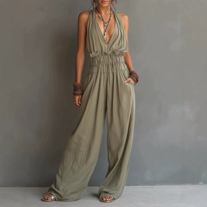 Combinaison pantalon dos nu décolleté en V, taille smockée et jambes larges palazzo