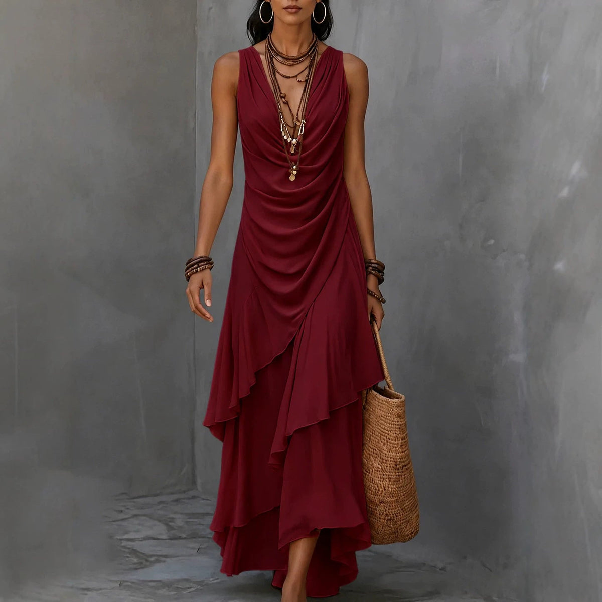 Robe longue asymétrique à volants, sans manches, avec col en V drapé
