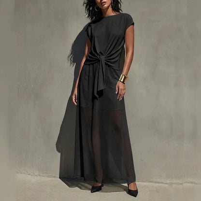 Robe longue élégante semi-transparente torsadée blanche